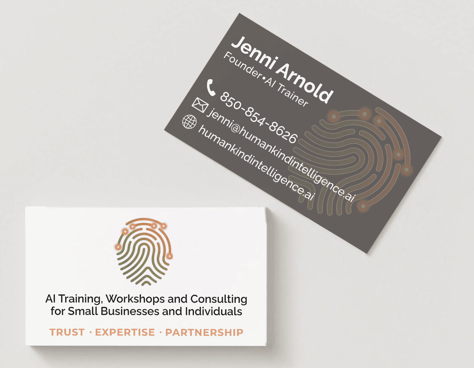 Human Kind Intelligence business cards — front and back